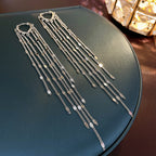 Silver tone disc chain fringe earrings, pair